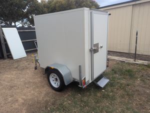 Low profile coolroom trailer parked on grass